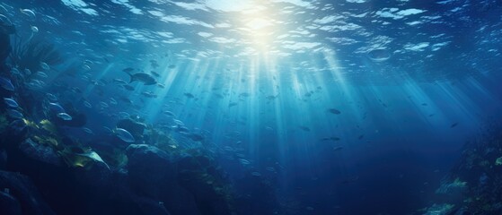 Sunlight piercing through marine depths with tropical fish. Underwater world. - obrazy, fototapety, plakaty