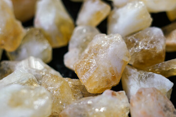 Rough yellow citrine stones. Mineral exchange. 