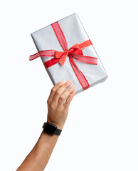 Close-up of man hand raising Christmas present up with white background
