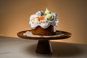 Appetizing pie with cream, macaroons, candied fruit and marmalade