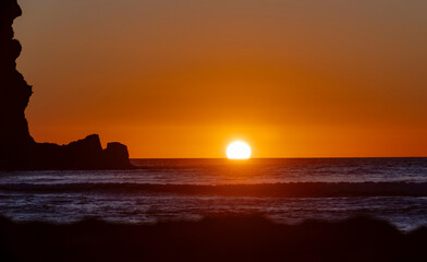 Sunset at Piha, West Auckland, Auckland region of New Zealand. January 12, 2024 - 9