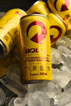 Skol beer cans on ice.