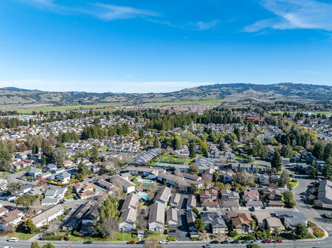 Aerial images over a community in Rohnert Park, California on a beautiful winter day with a blue sky