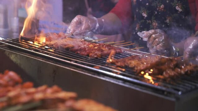 Filipino Street Food Barbecue Ihaw - ihaw at Baguio Night Market - 60fps 4k Slow motion