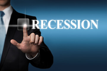 Recession - businessman pressing virtual touchscreen button