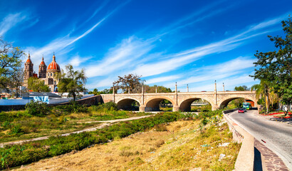 Old colonial bridge and Parish of the Light in Lagos de Moreno. UNESCO world heritage in Jalisco, Mexico