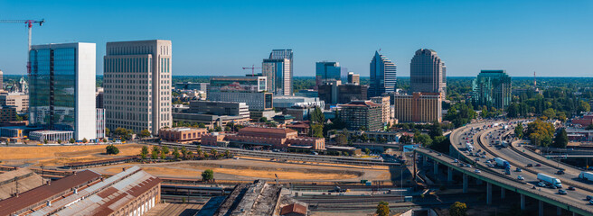 The Tower Bridge in Sacramento, California with the city of of Sacramento in the background and...