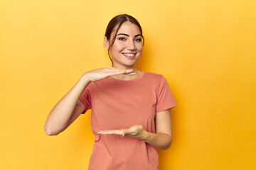 Obraz premium holding something with both hands, product presentation.