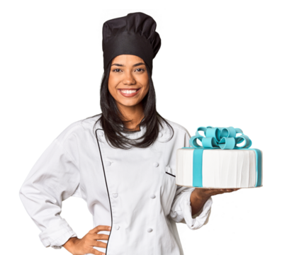 Young Filipina chef presenting freshly baked cake showing a copy space on a palm and holding another hand on waist.