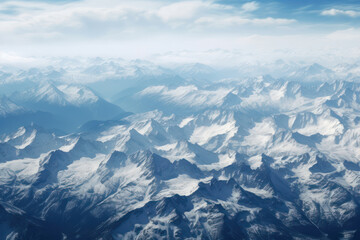 Obraz premium Majestic Journey: Aerial View of Snow-Capped Mountains, White Peaks, and Billowing Clouds in Chile's Andes Landscape