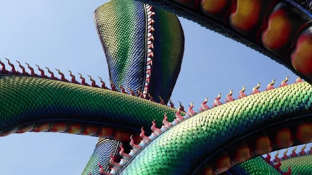 Ancient large blue naga at Wat Tam Cheng temple in Phetchaburi, Thailand