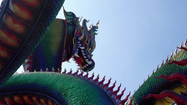 Ancient large blue naga at Wat Tam Cheng temple in Phetchaburi, Thailand