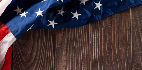 Happy presidents day. USA flag on brown old wooden background board, top view flag of United States America with copy space, banner design, Patriot Day, Independence Day