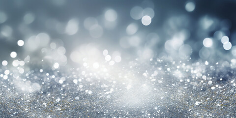 Glitter background in pastel delicate silver and white tones de-focused glitter vintage lights.