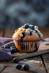 blueberry muffin on a wooden table