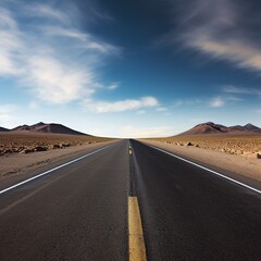 Fototapeta na wymiar Long and winding road through a barren desert landscape