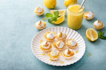 Little lemon meringue tartlets with filo pastry base