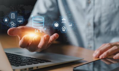 Entrepreneur using electronic devices for store customer data to gain customer insight in order to create marketing campaign that can help to increase sale and identify potential customer.