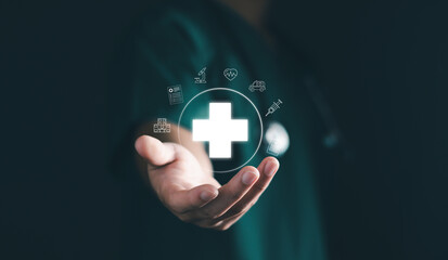Doctor hand holding virtual medical health care icons with medical network connection. People health care awareness rising growth of medical health and life insurance business.