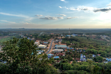 Fototapeta na wymiar Krong Ban Lung, Cambodia - December 29, 2023: Panoramic view of Krong Ban Lung town in Cambodia from a high hilltop
