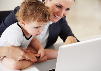 Working, mom and happy with baby on laptop for business, work or multitask motherhood and career....