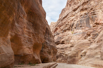 Tourist route at beginning of gorge Al Siq in Petra in Wadi Musa city in Jordan