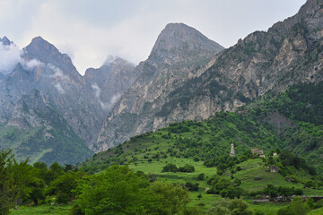 Obraz premium Misty mountains of Tsey-Loam ridge on a cloudy day