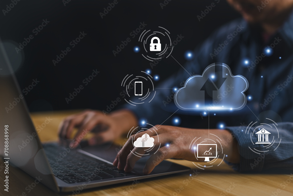 Fototapete Man use Laptop with cloud computing diagram show on hand. Networking and internet service concept. Cloud technology. Data storage. .
