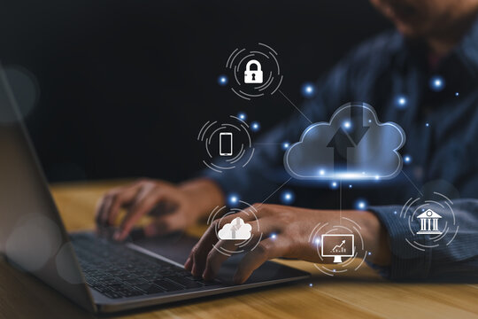Man use Laptop with cloud computing diagram show on hand. Networking and internet service concept. Cloud technology. Data storage. .