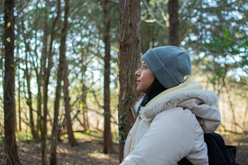 Fototapeta premium Gorgeous young lady resting in the forest