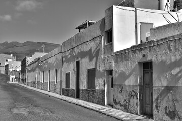 Fototapeta na wymiar Black and white image of alleyways in Agüimes on Grand Canary