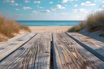Papier Peint photo autocollant Descente vers la plage Wooden Boardwalk with Blurry Beach Background