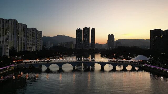 Shing Mun River with skyscrapers in Hong Kong Dec 24 2023