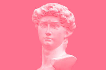  pink antique statue of david's head marbel Concept of modern art and cyberpunk with pink background