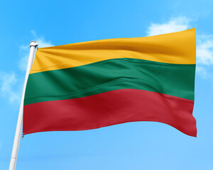 Lithuania flag fluttering in the wind on sky.