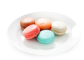 Macarons. Dessert. Dish on a plate. Isolated.