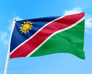 Namibia flag fluttering in the wind on sky.