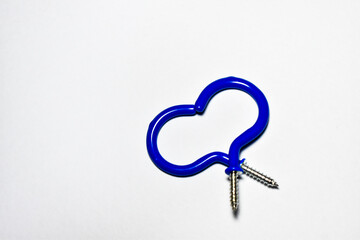 Two blue hooks with screw for a heart shape on a white background