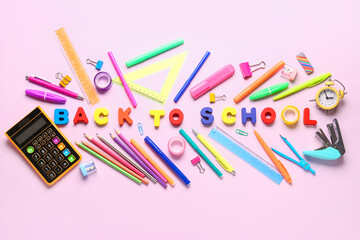 Frame made of colorful stationery supplies and text BACK TO SCHOOL on pink background