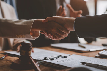 Lawyer shaking hands with businessman, investor in financial agreement, partner congratulating success or lawyer discussing contract agreement. Handshake concept. Agreement. - obrazy, fototapety, plakaty