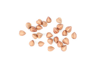 Many dry buckwheat grains isolated on white, top view