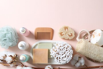 Fototapeta na wymiar Bath accessories. Flat lay composition with personal care products on pink background, space for text