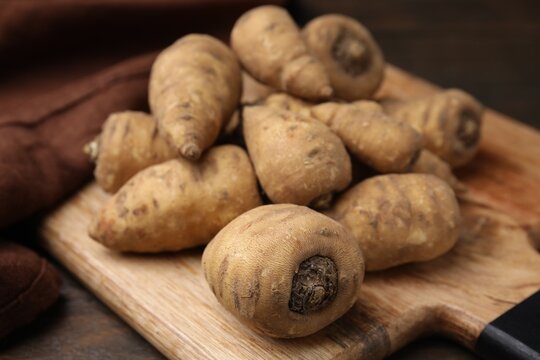 Tubers of turnip rooted chervil on table, closeup