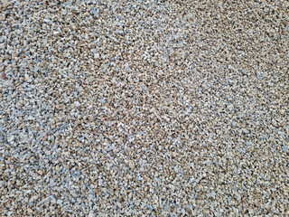 crushed stone for concrete mix. large piles of crushed granite or gravel in the concrete industry.