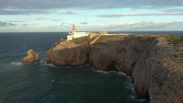 Aerial video of the lighthouse and cliffs at Cape St. Vincent. The sea view of the Algarve