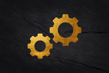 Gold gear icon. gold metal gears and cogs. Mechanism wheels logo. Cogwheel concept template....