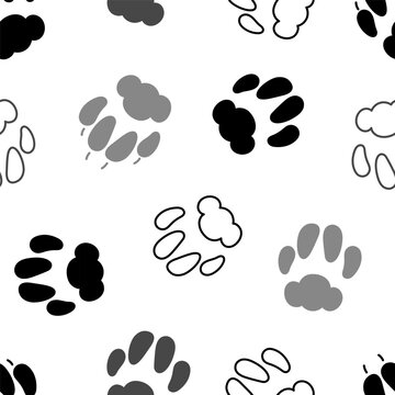 Cat paw prints seamless pattern. Different feline footprint tracks monochrome silhouettes on white background. Vector illustration.