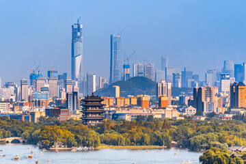 Scenery of Daming Lake in Jinan, Shandong, China and the CBD in the distant new area
