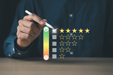 Business man give five stars survey rating for customer satisfaction scores. customer satisfaction...