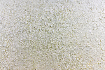 Roughly plastered wall with winter matte texture